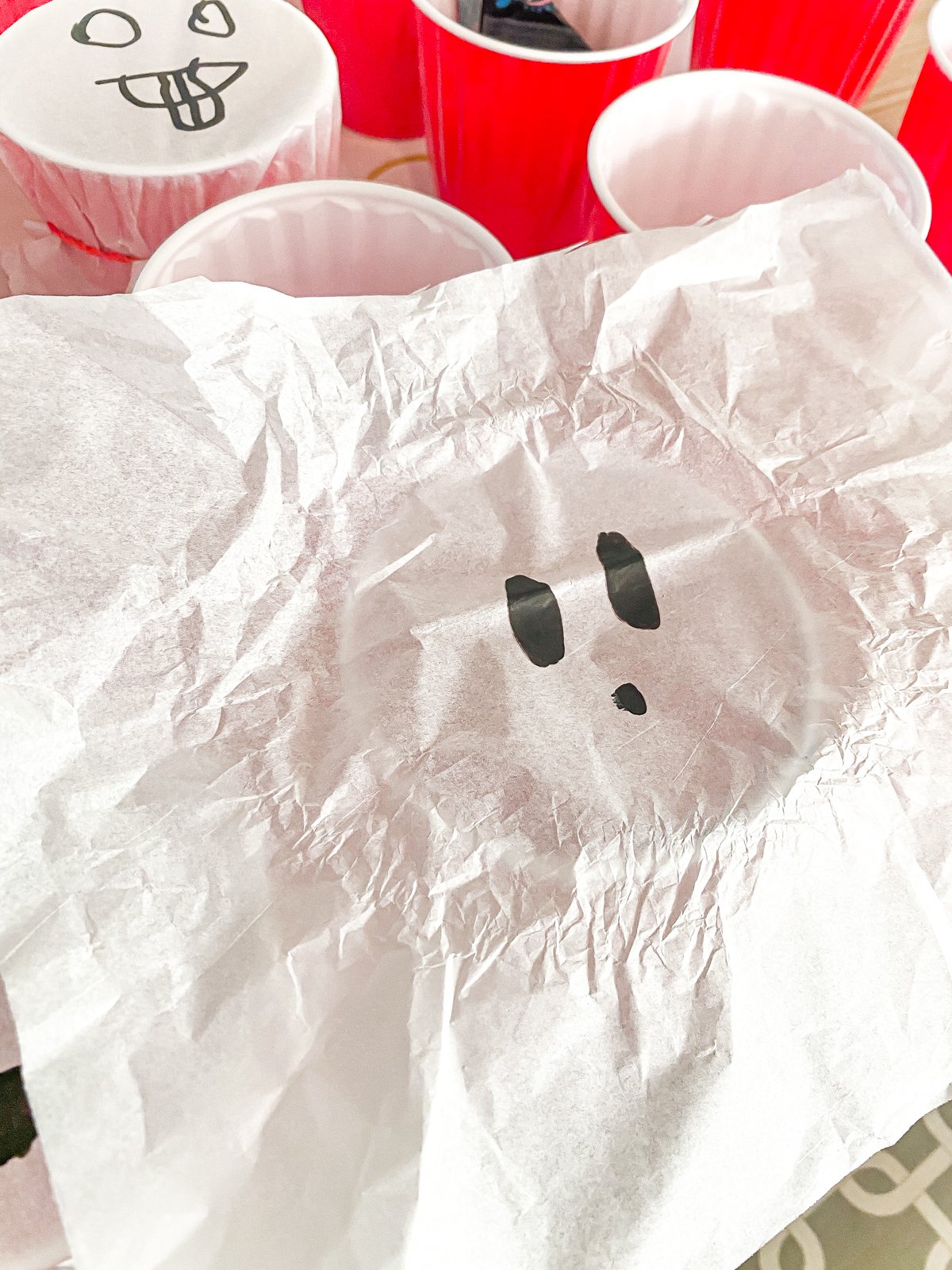 piece of tissue paper over top of a ghost