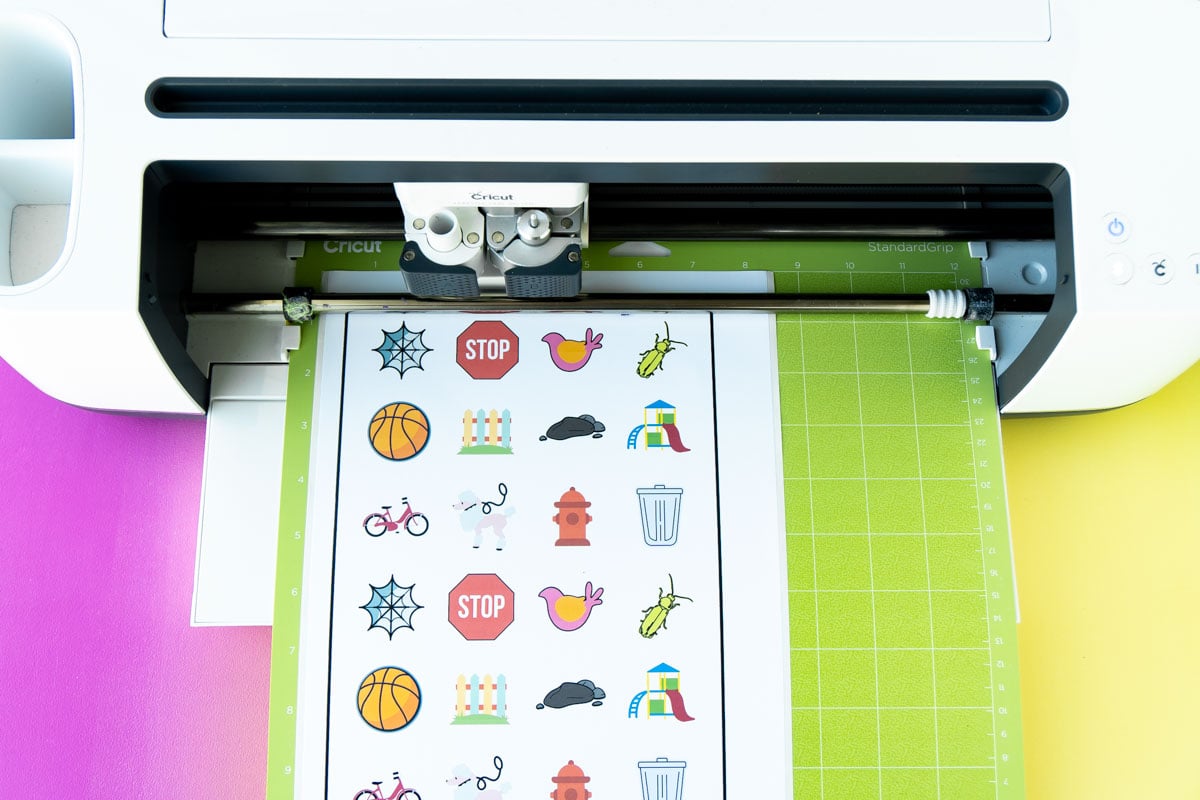 outdoor scavenger hunt stickers loaded into a Cricut Maker