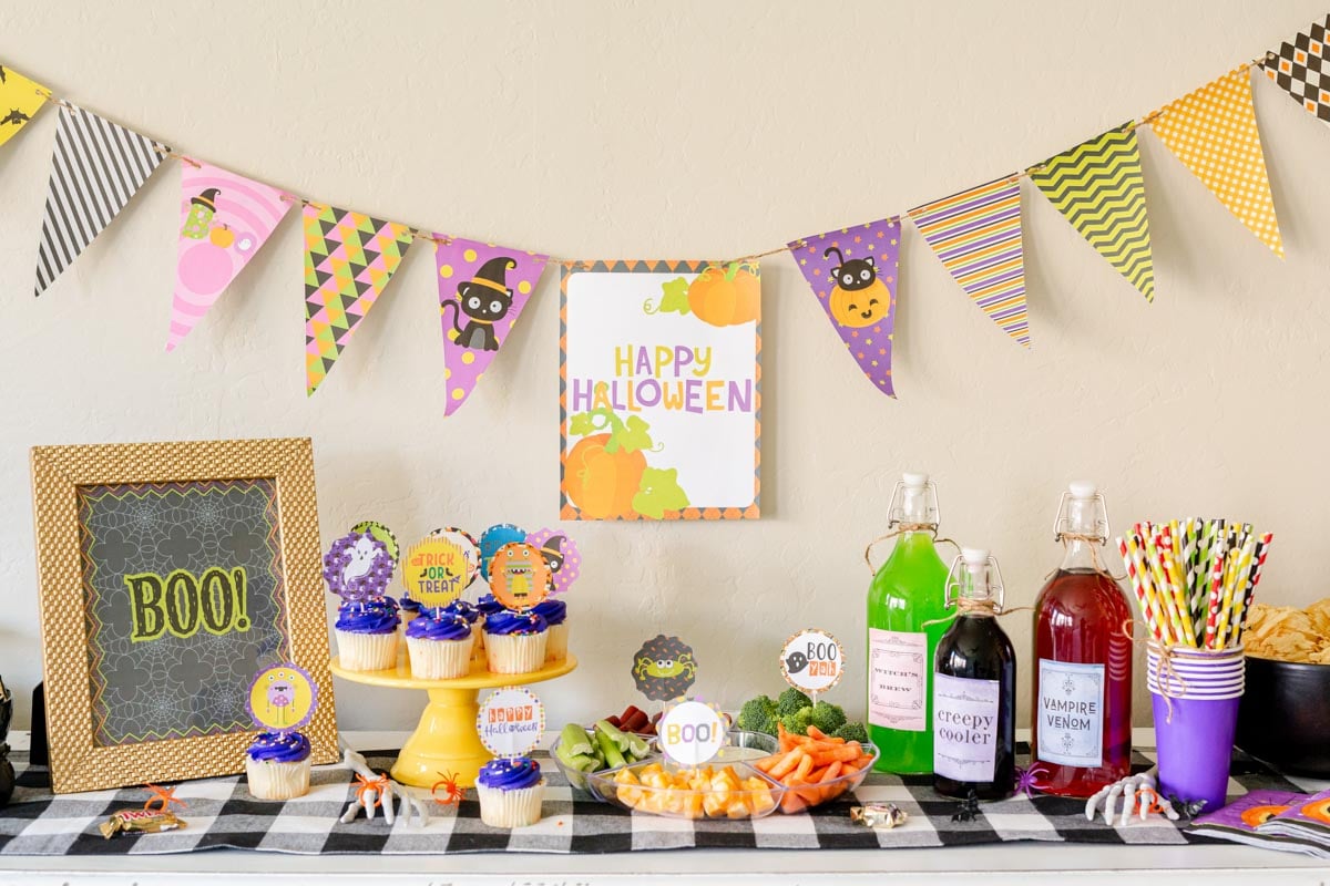 printable Halloween banner behind Halloween treats