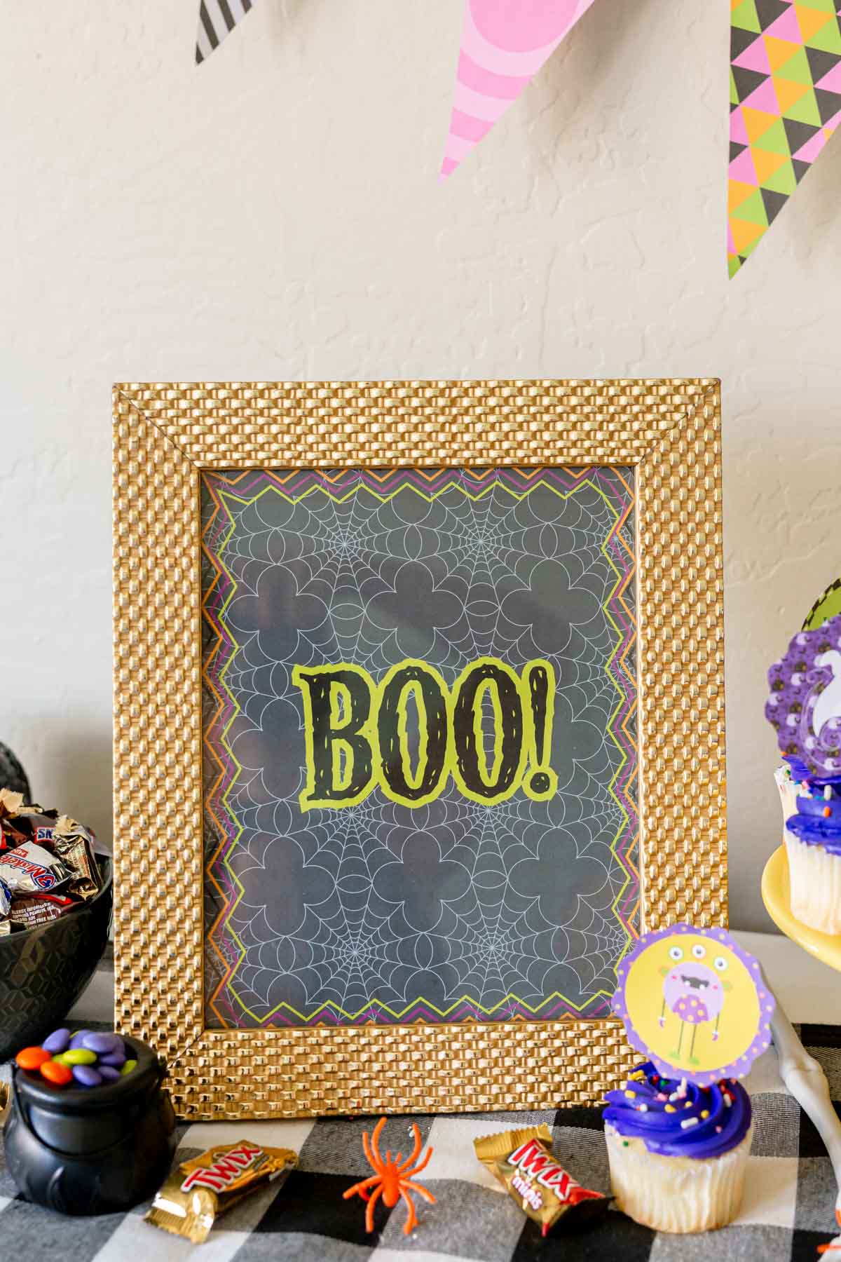 Framed Halloween wall art on a table