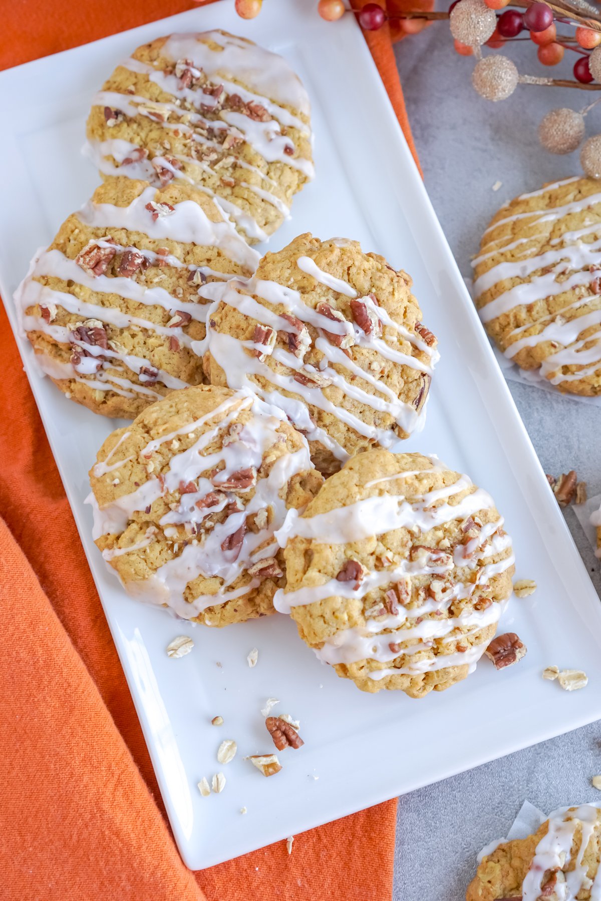 white plate with pumpkin oatmeal cookies