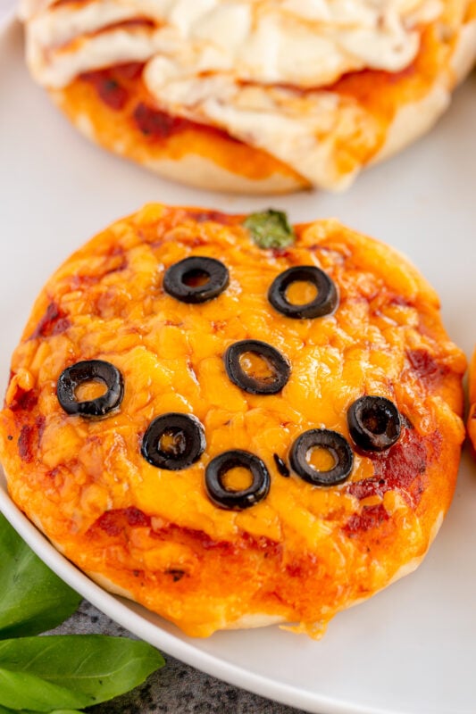 Pumpkin pizza on a white plate