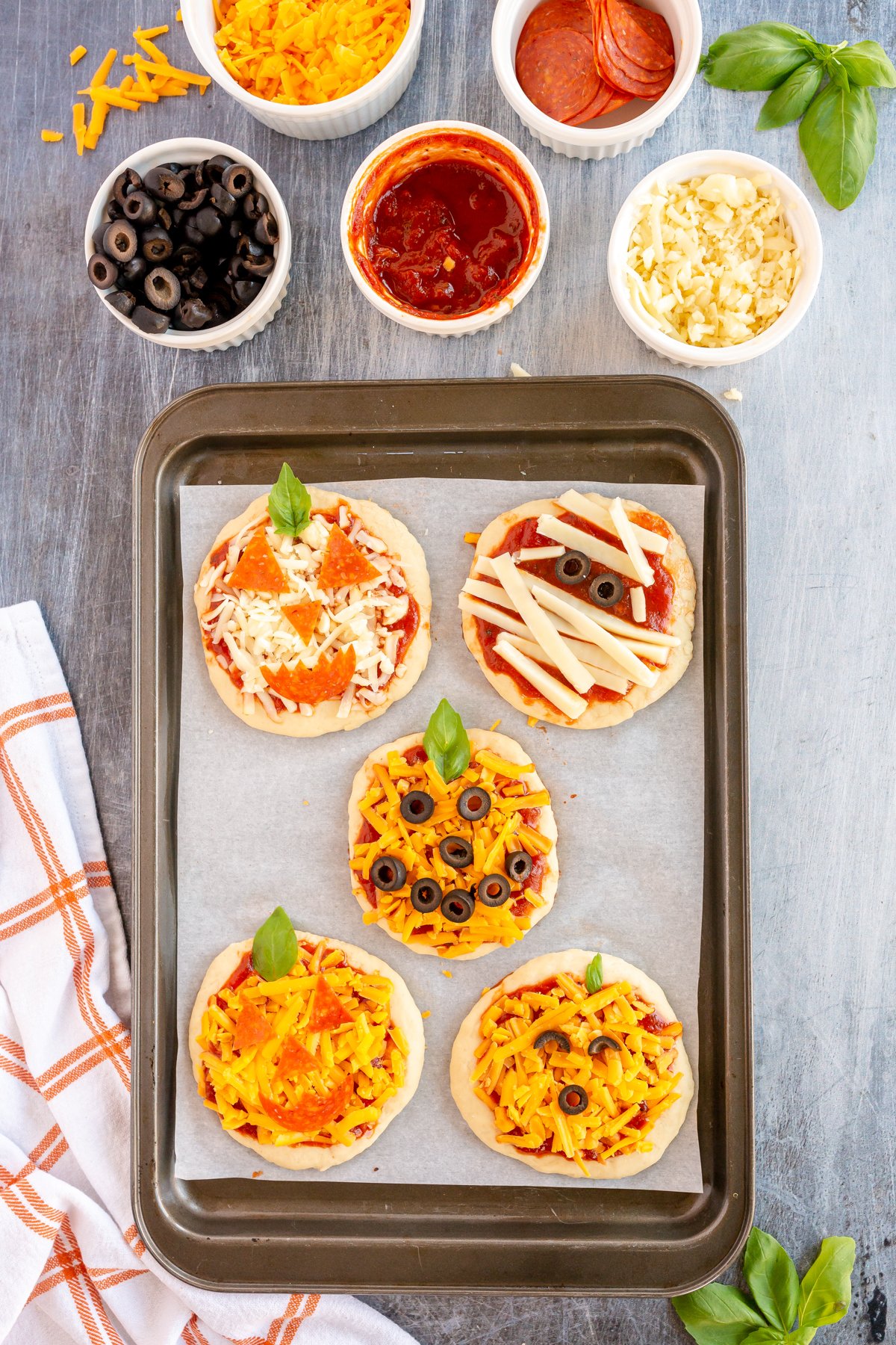 pumpkin pizza on a baking sheet