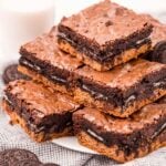 stack of slutty brownies on a white plate