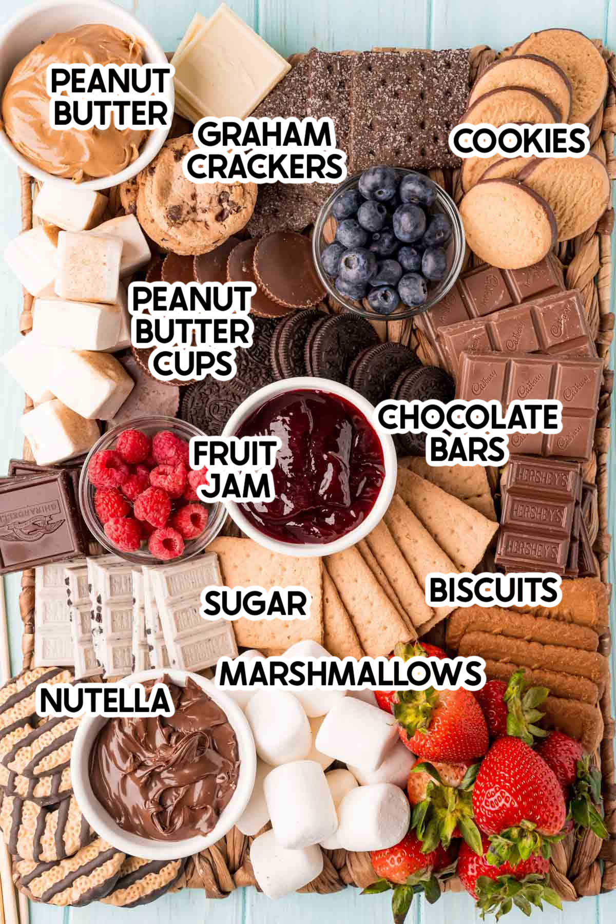 ingredients on a s'mores board with labels