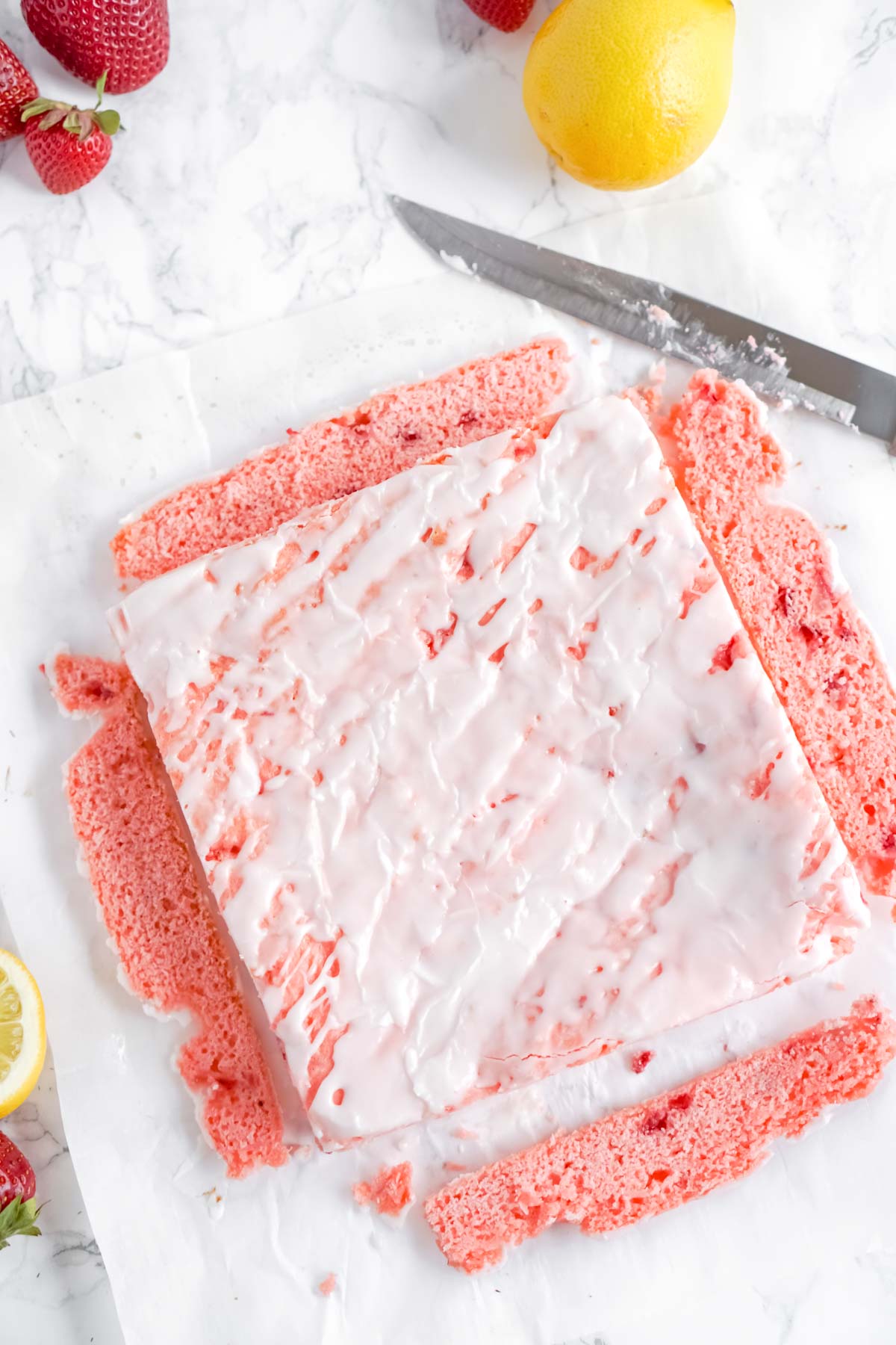 strawberry brownies topped with glaze