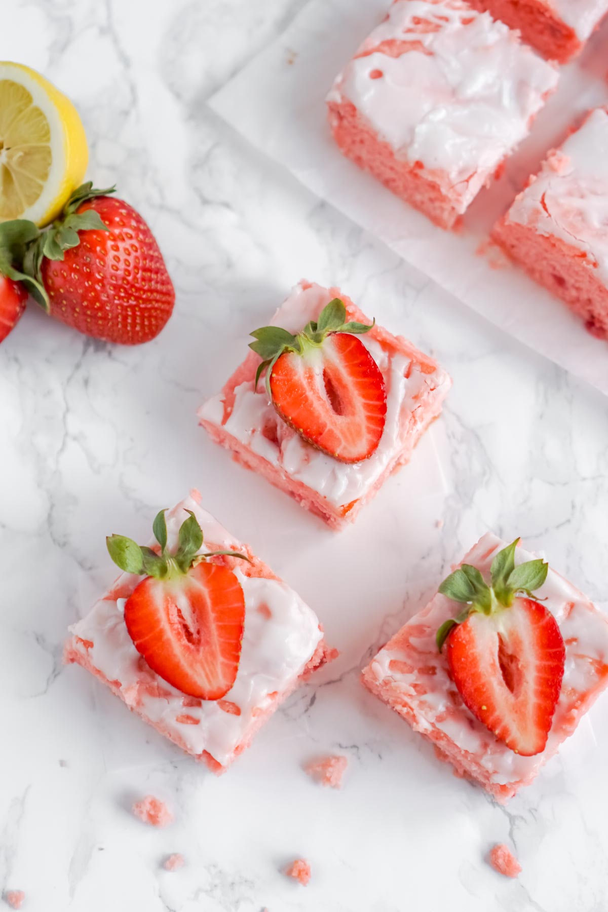 strawberry brownies with sliced strawberries on top