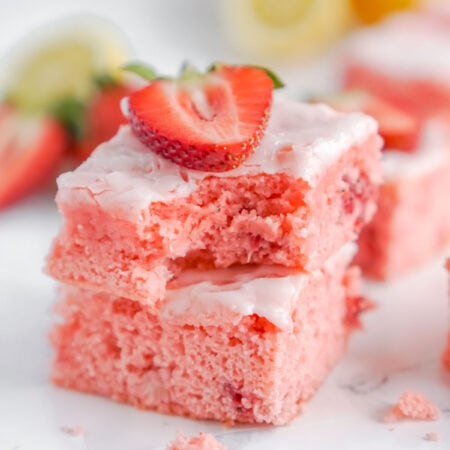 two strawberry brownies stacked on top of each other