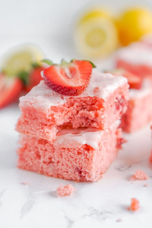 two strawberry brownies stacked on top of each other