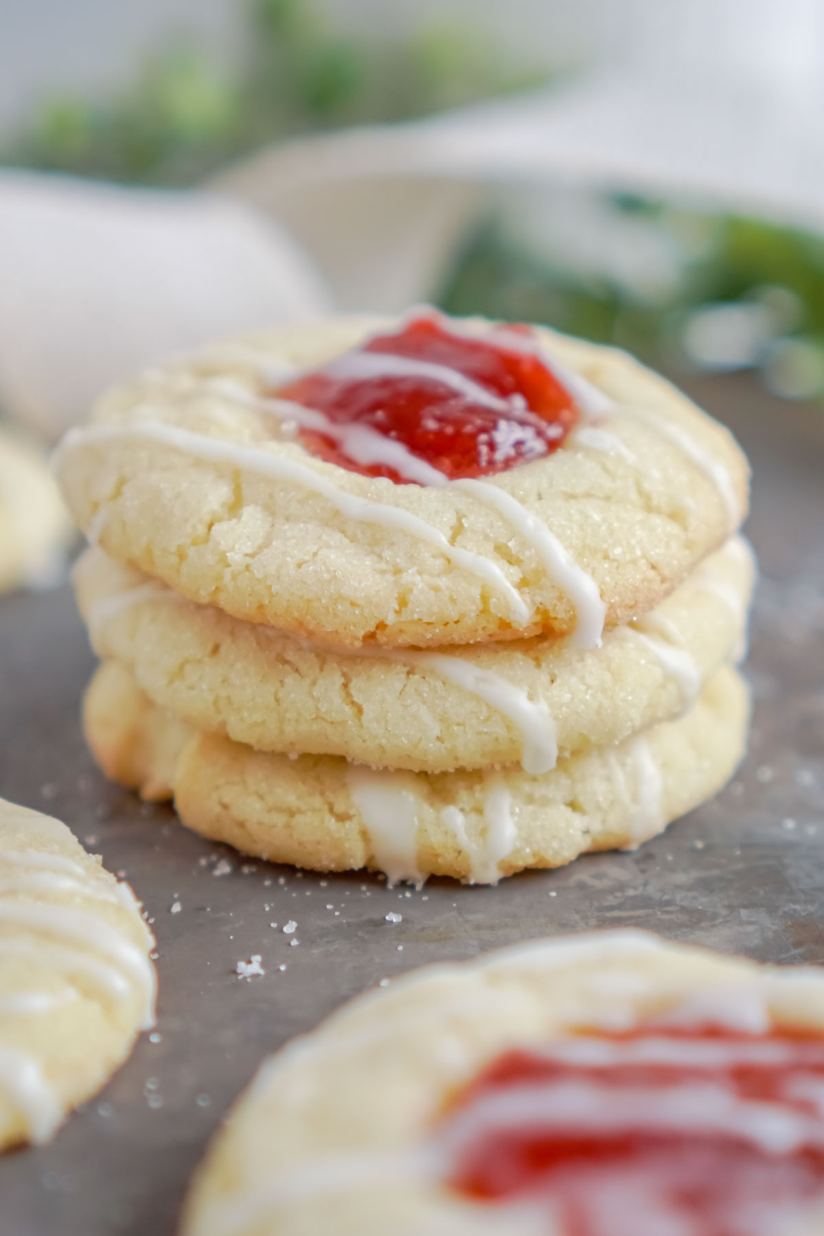 stack of strawberry thumbprint cookies
