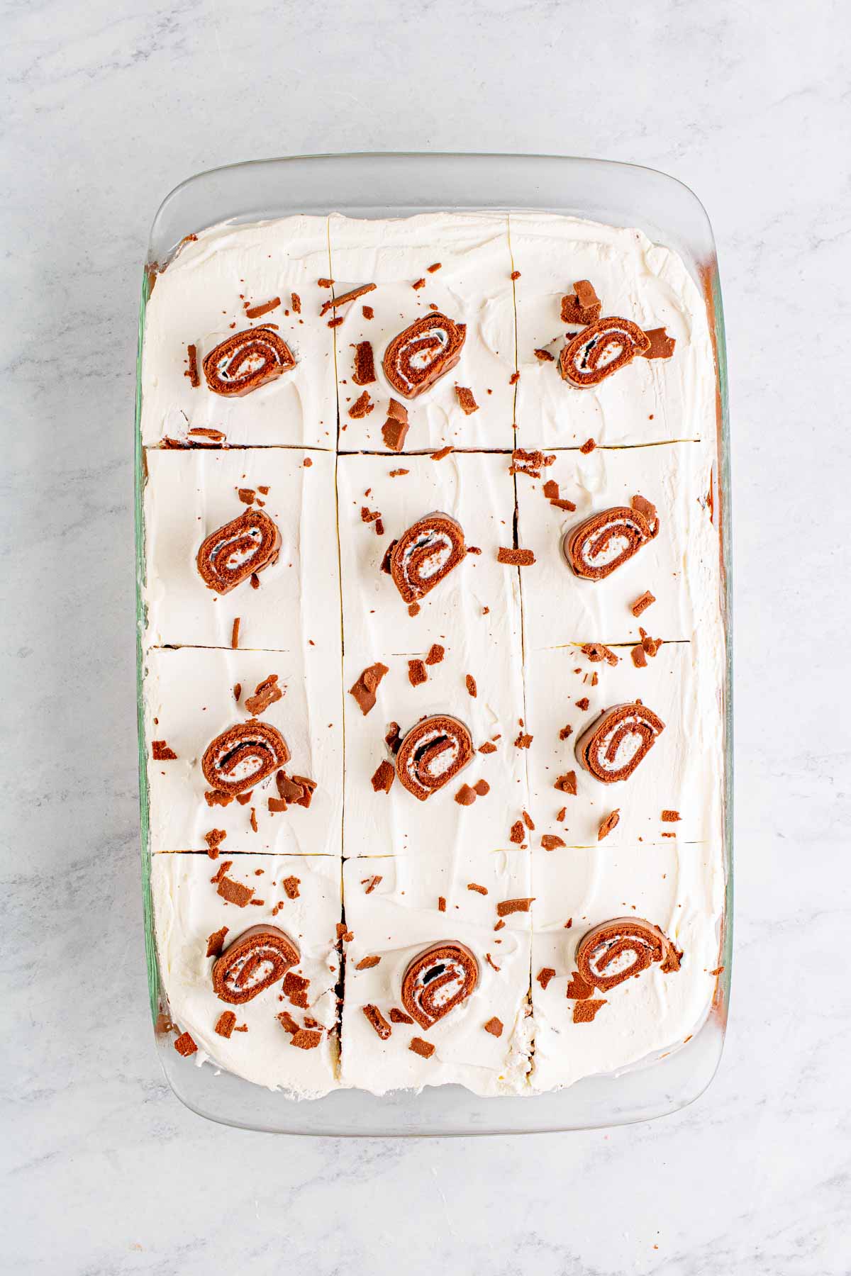 swiss roll cake topped with swiss roll cakes