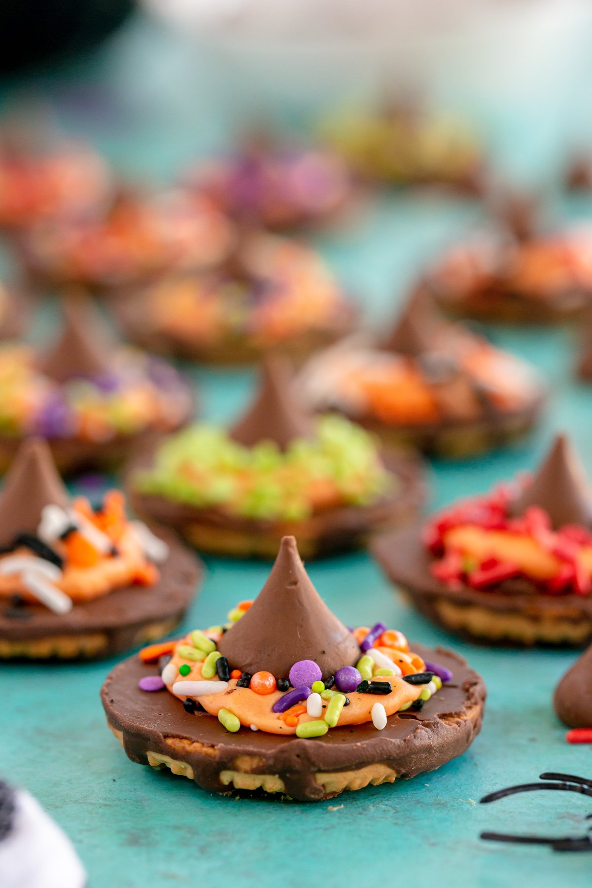 a bunch of witch hat cookies 