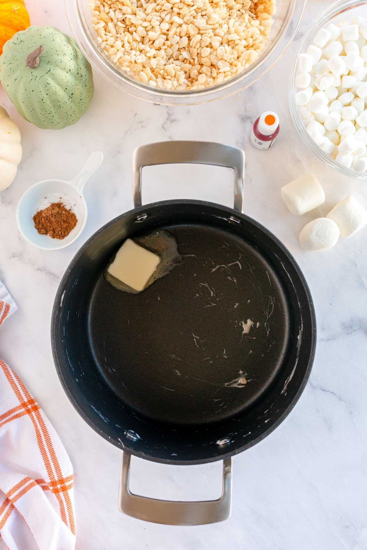 butter melting in a metal pot