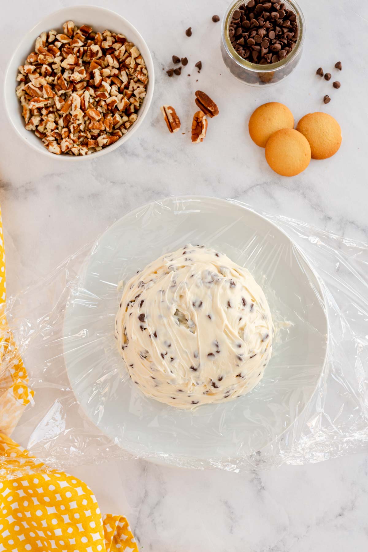 chocolate chip cheese ball on a white plate