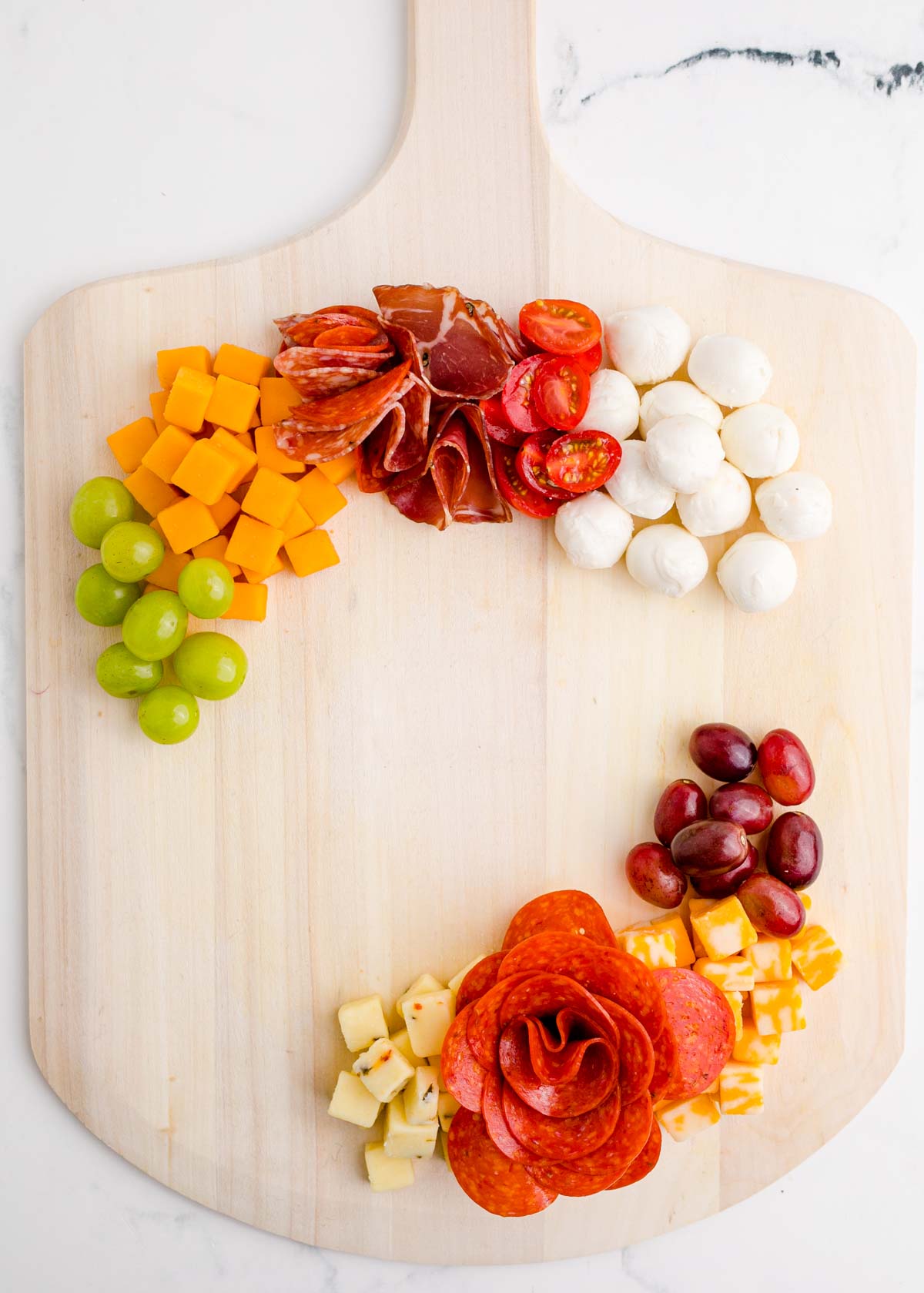 an almost full Christmas charcuterie board wreath