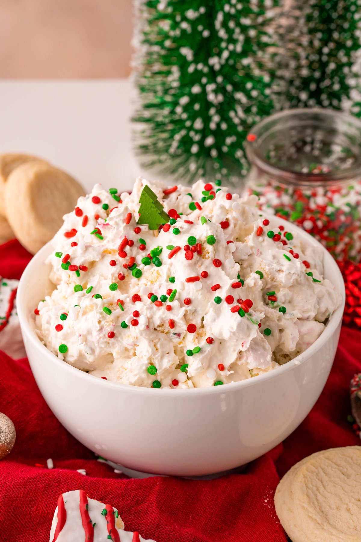 Christmas tree cake dip in a white bowl