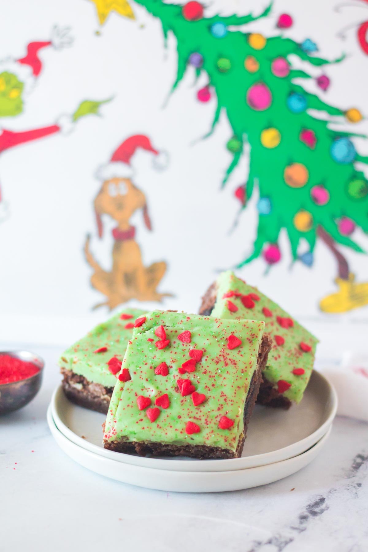 a plate full of Grinch brownies