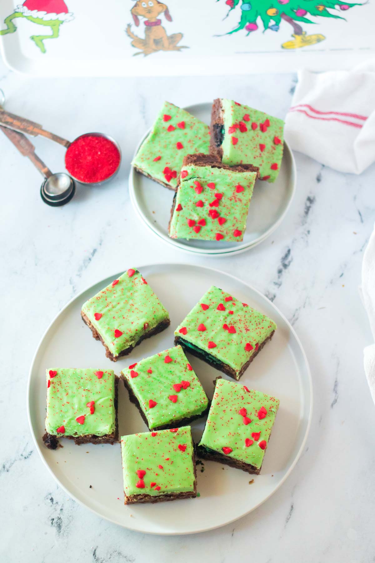 Grinch brownies on a white plate