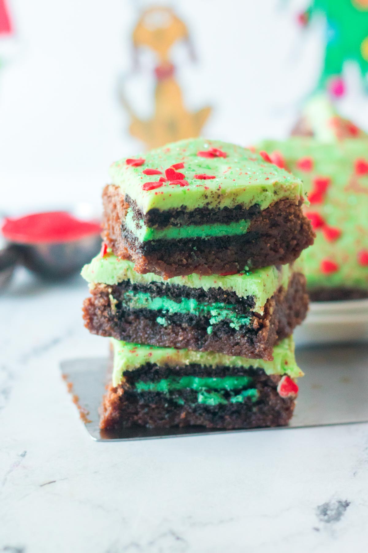 Grinch brownies in a stack