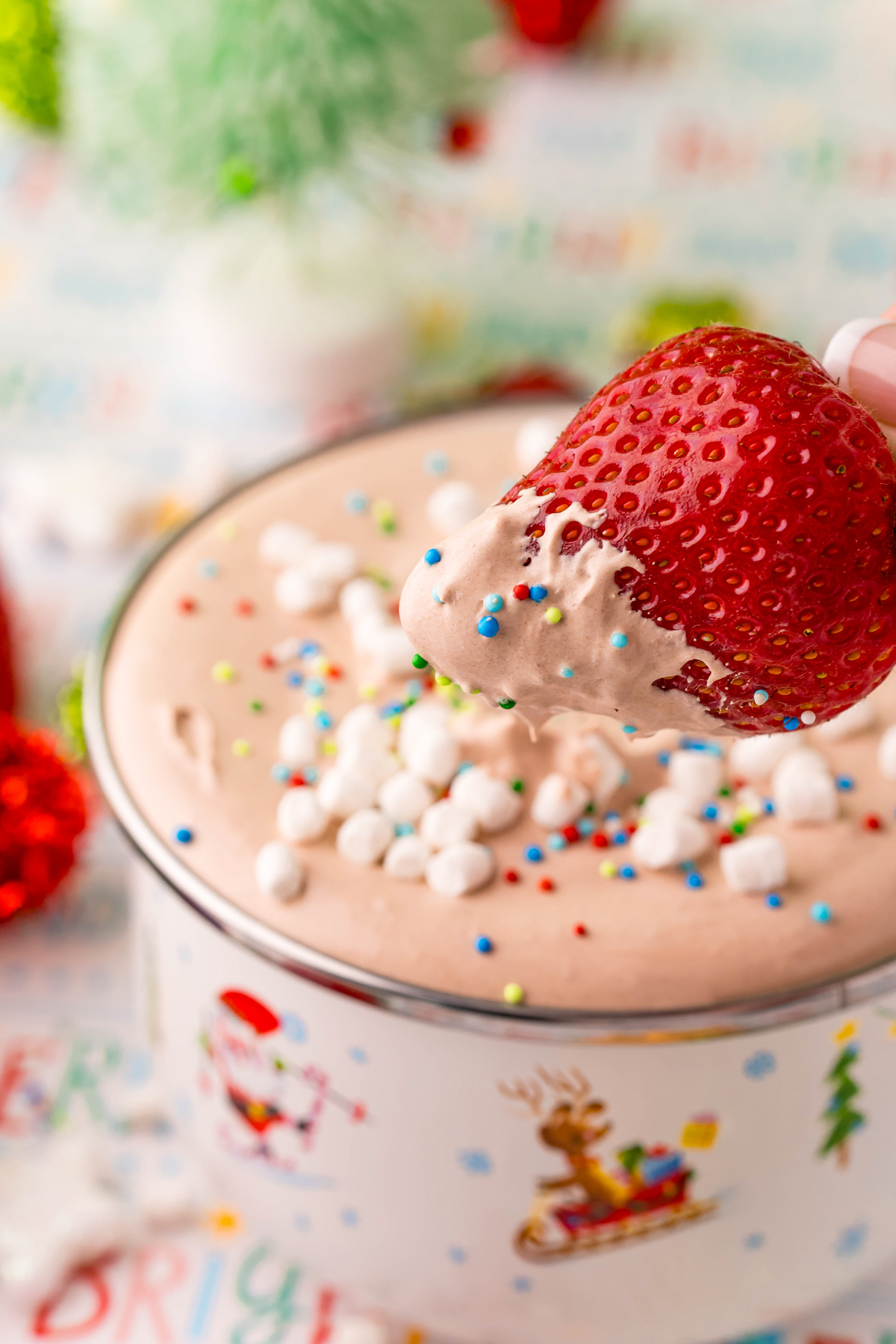 strawberry above a hot chocolate dip
