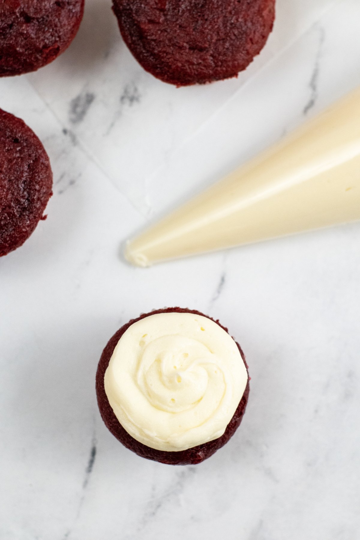 red velvet cupcakes with buttercream frosting
