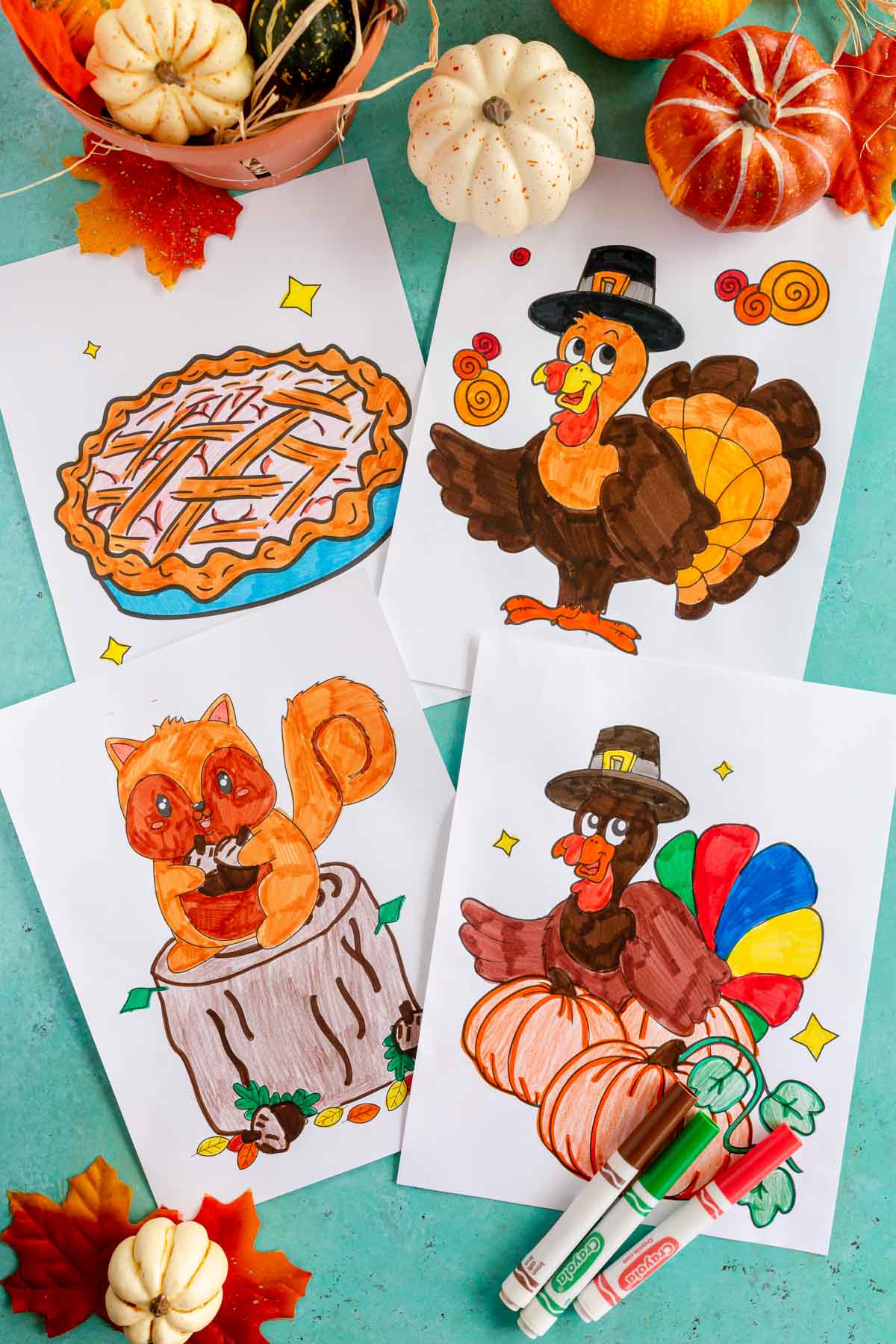 Four printed out Thanksgiving coloring pages