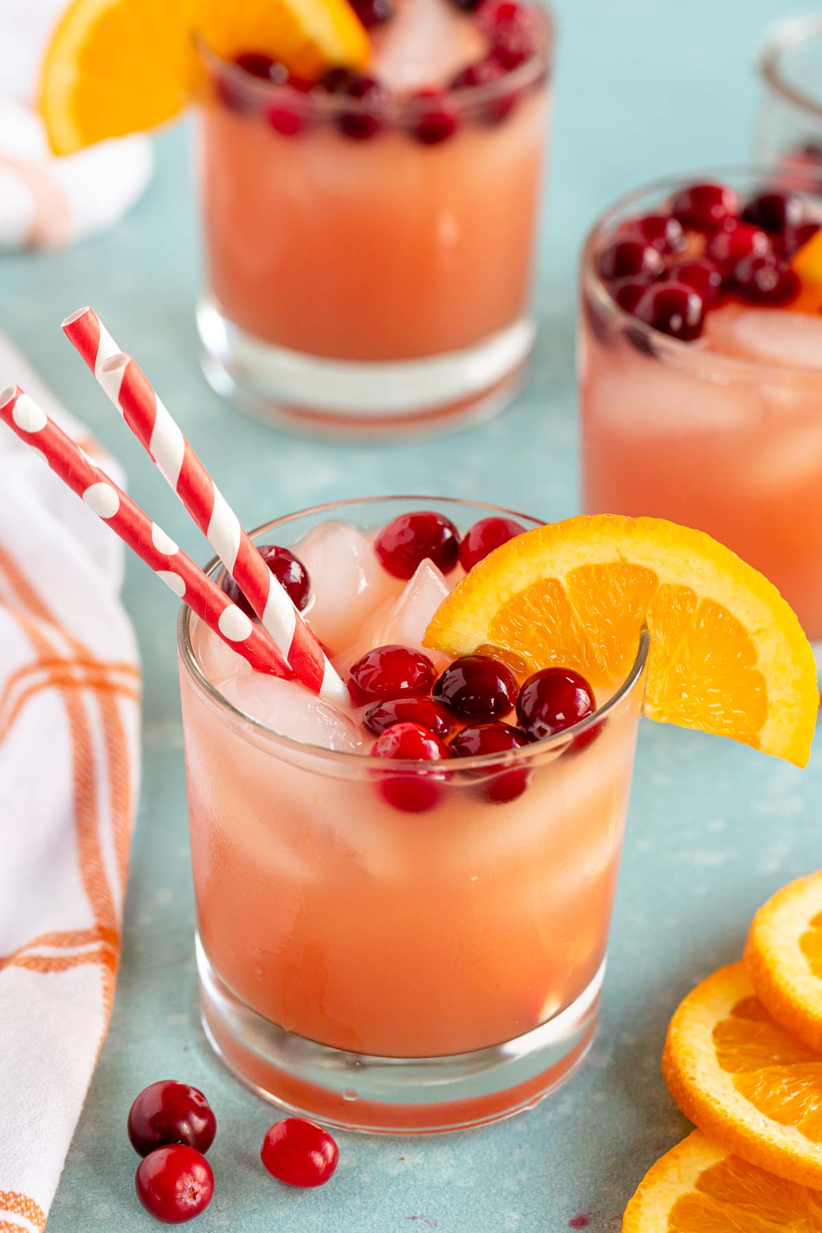 glass with Thanksgiving punch and straws
