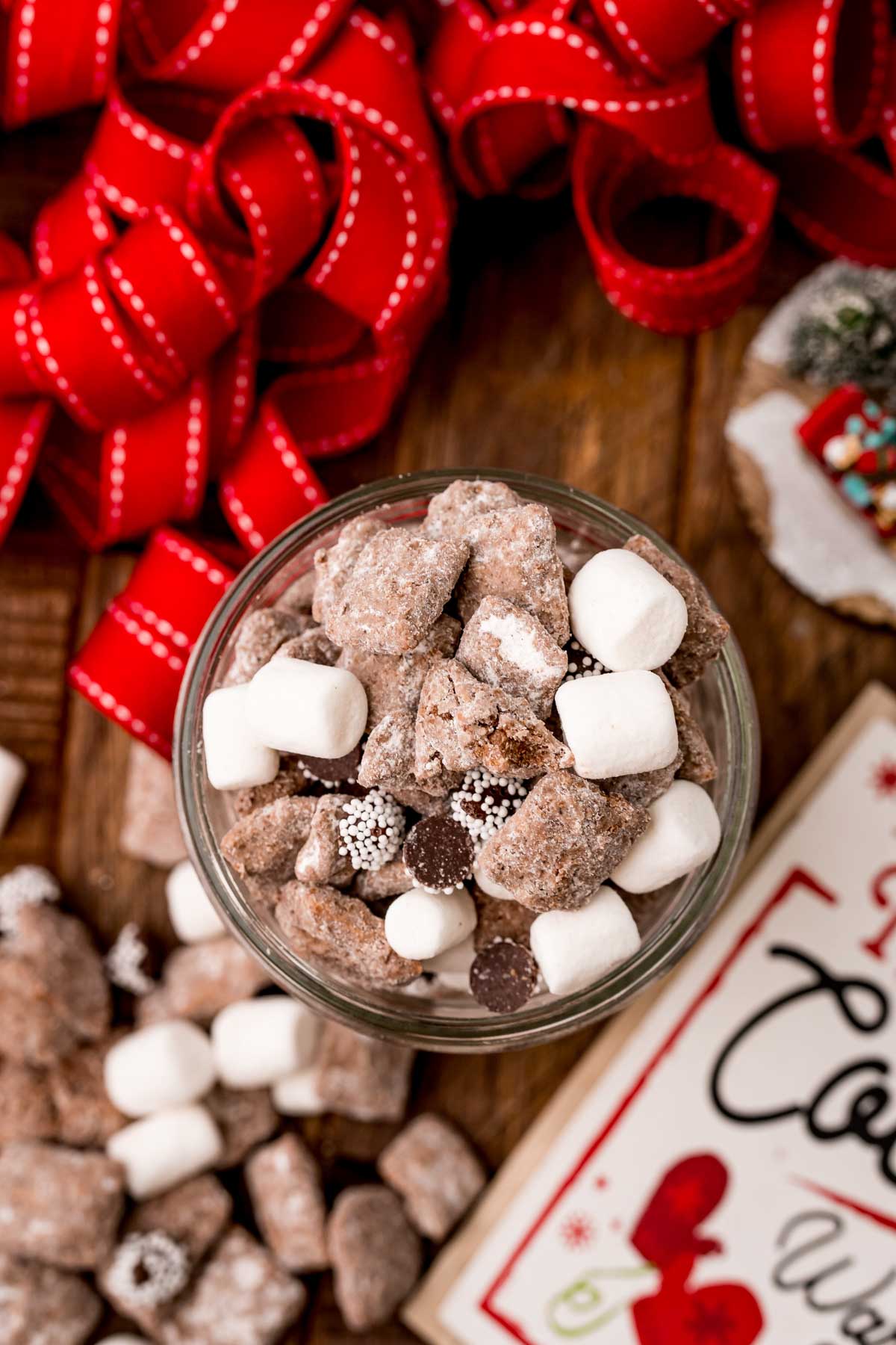 glass jar with Christmas muddy buddies