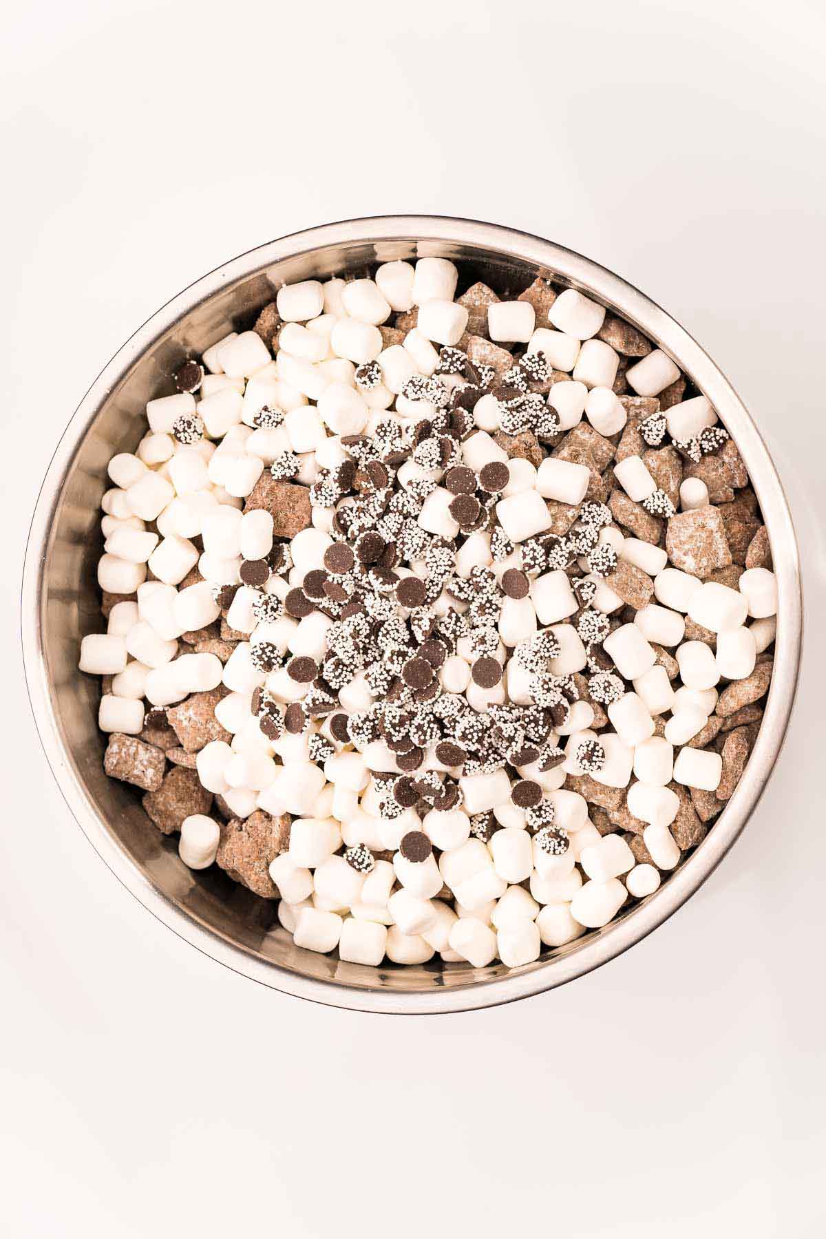 glass bowl with Christmas muddy buddies