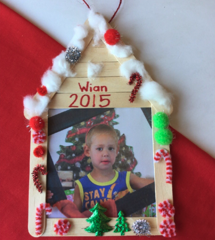 gingerbread house made out of popsicle sticks