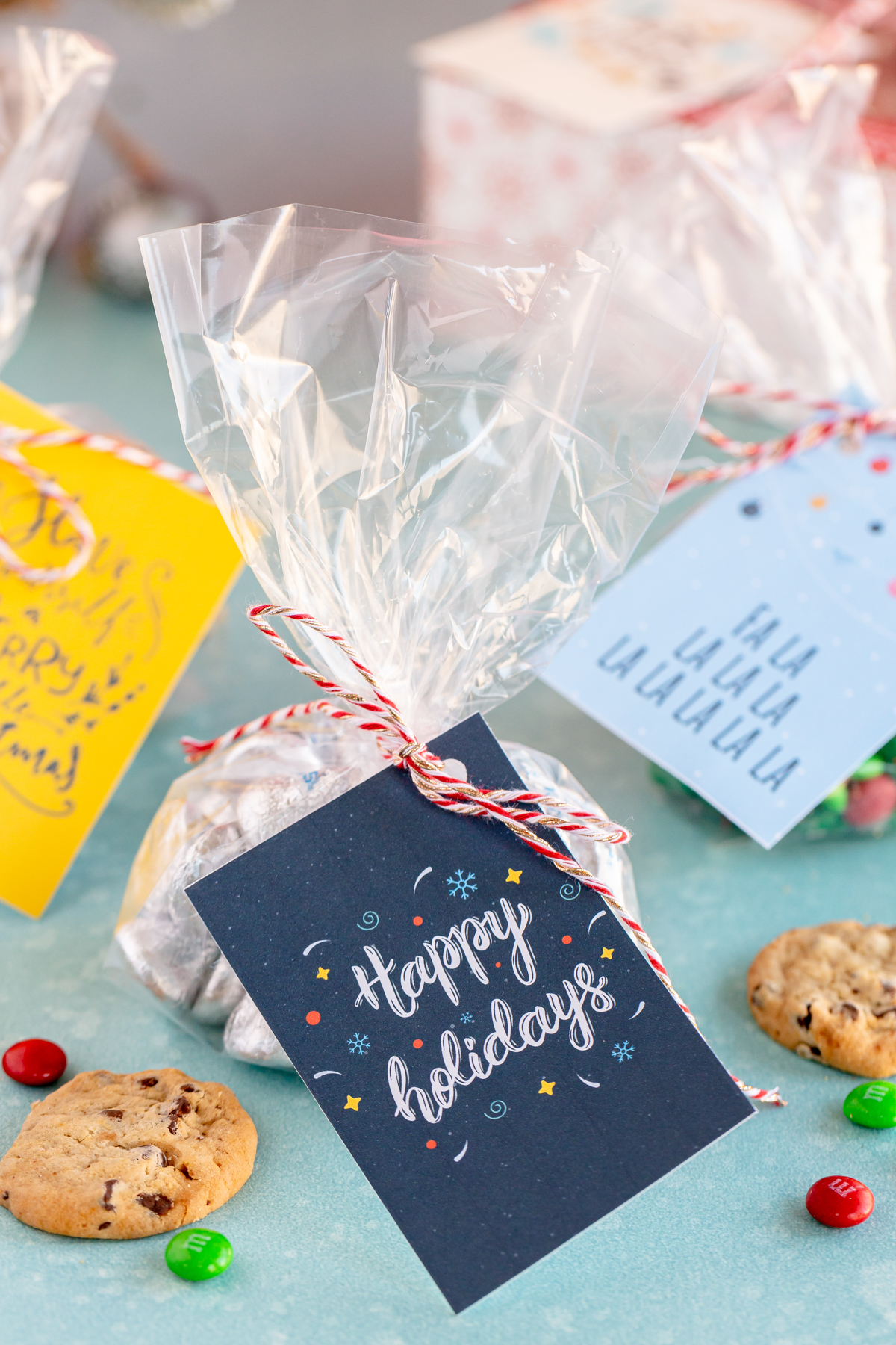 Bags of treats with Christmas gift tags