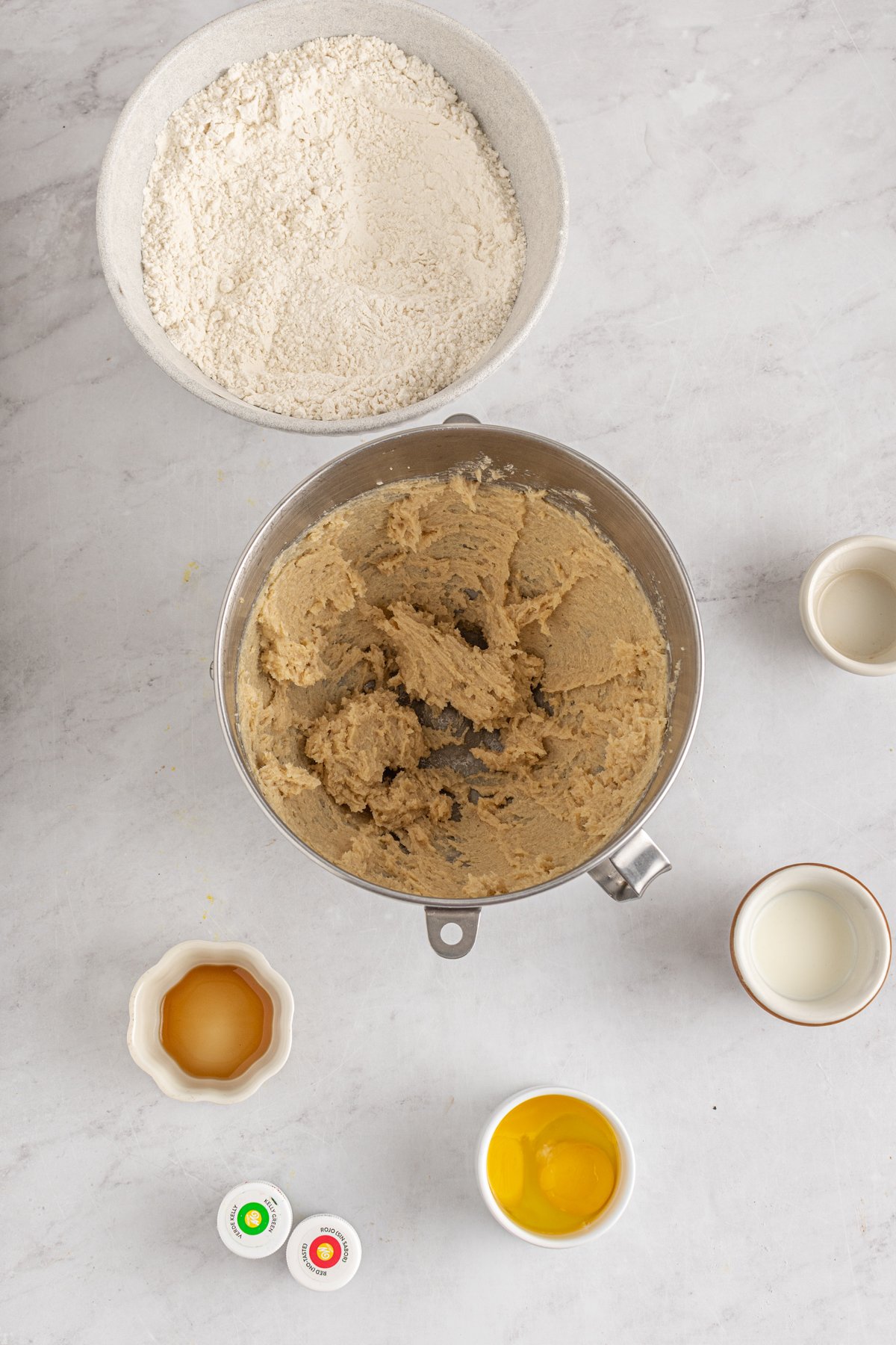 creamed butter and sugars in a metal mixing bowl