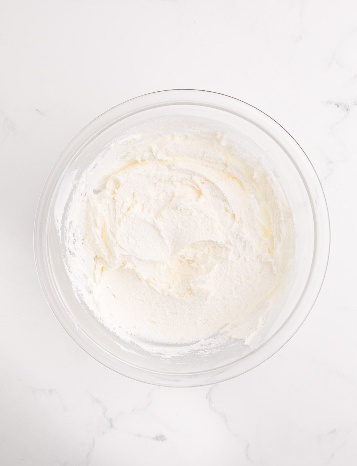 buttercream frosting in a glass bowl