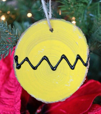 Charlie Brown ornament hanging in a tree