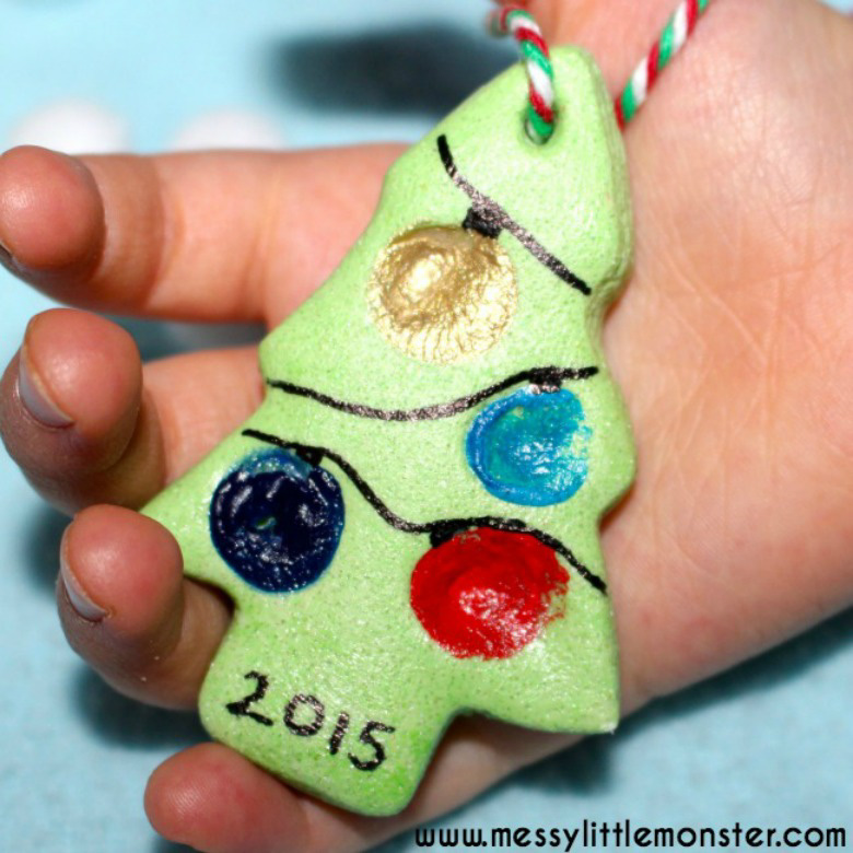 hand holding a salt dough Chrismas tree ornament