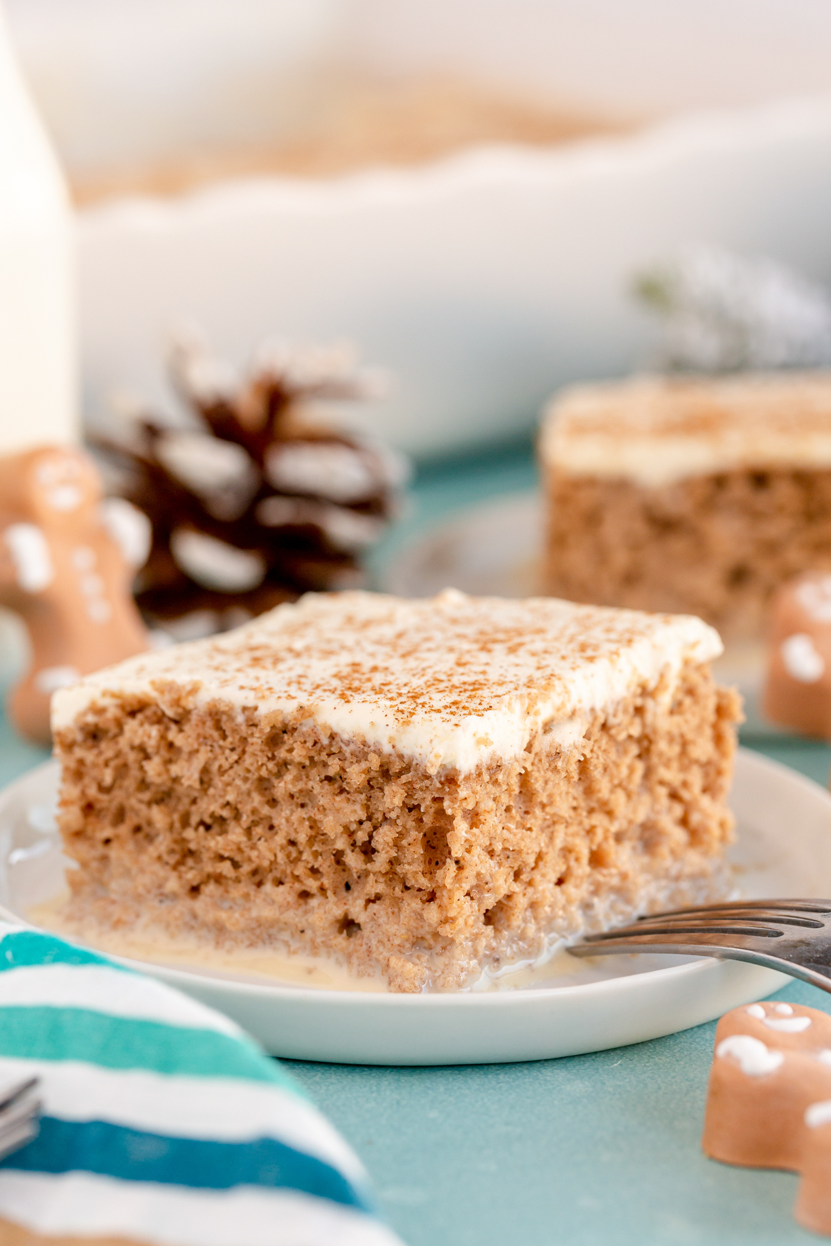 squares of gingerbread cake on a white plate