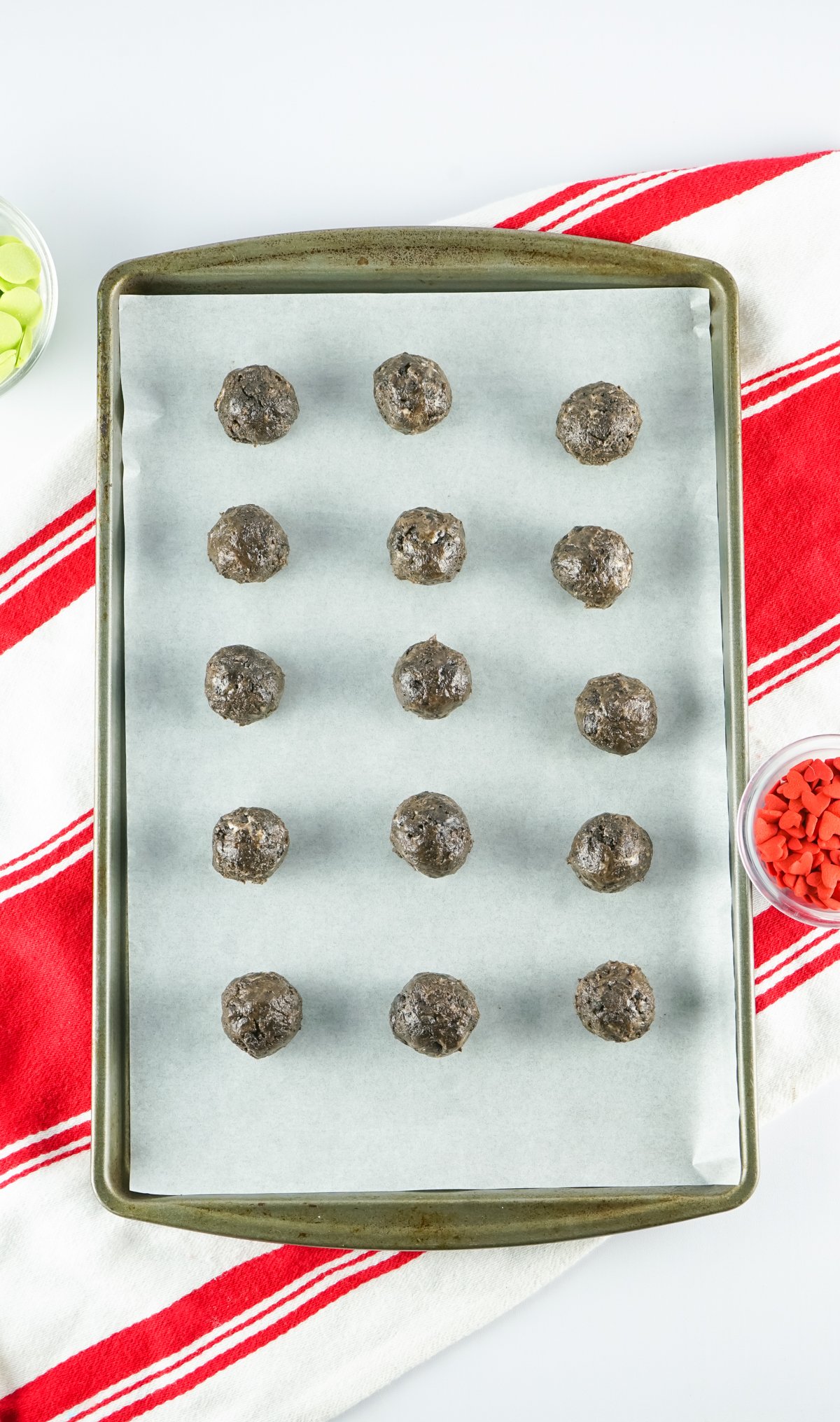 Oreo balled rolled out on a baking sheet