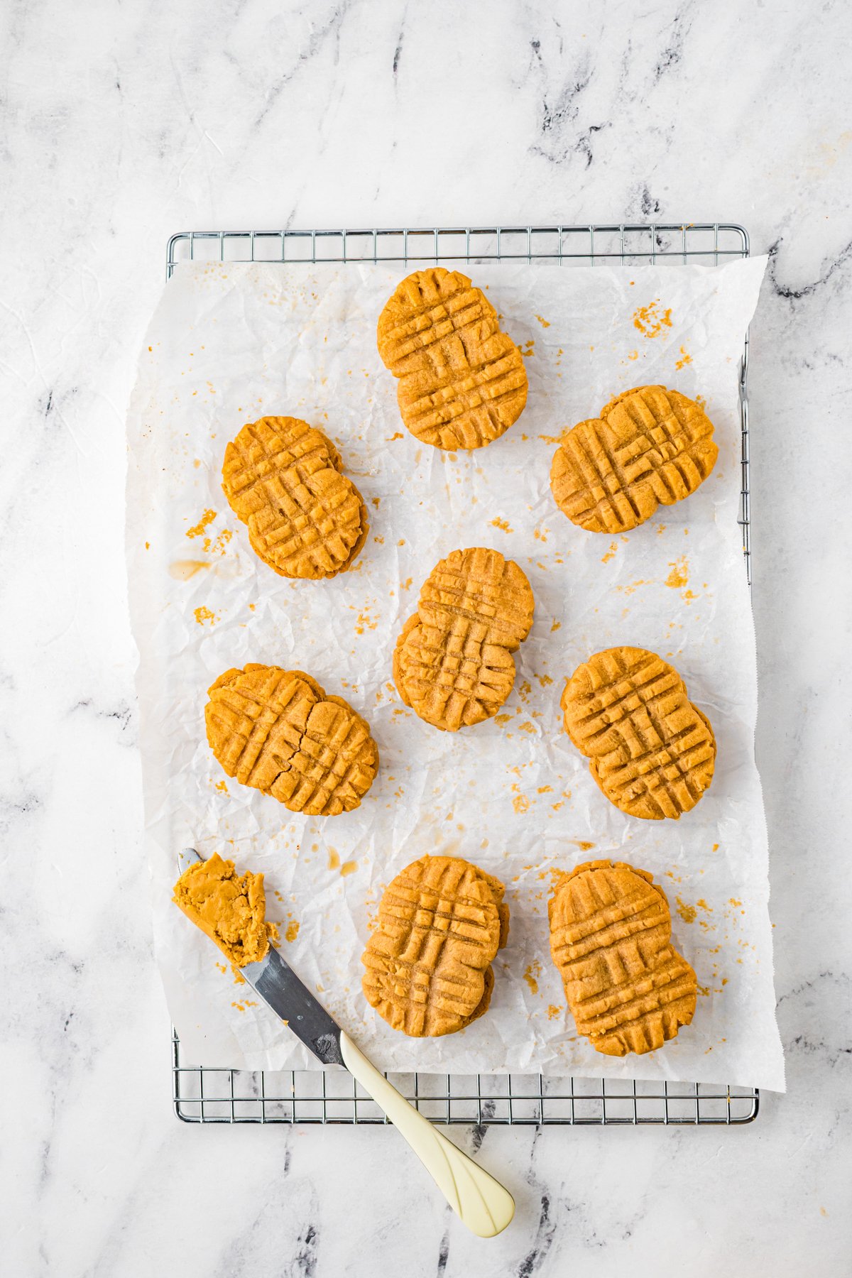 peanut butter sandwich cookies on a baking sheet