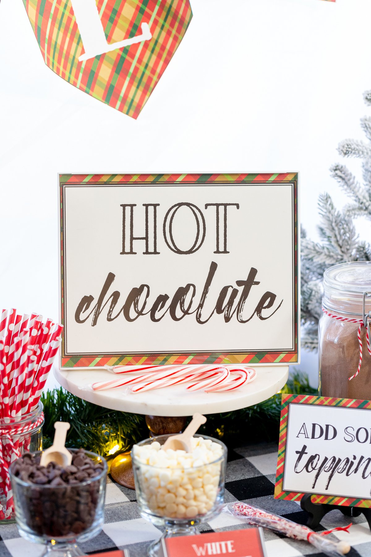 hot chocolate sign on a wood cake stand