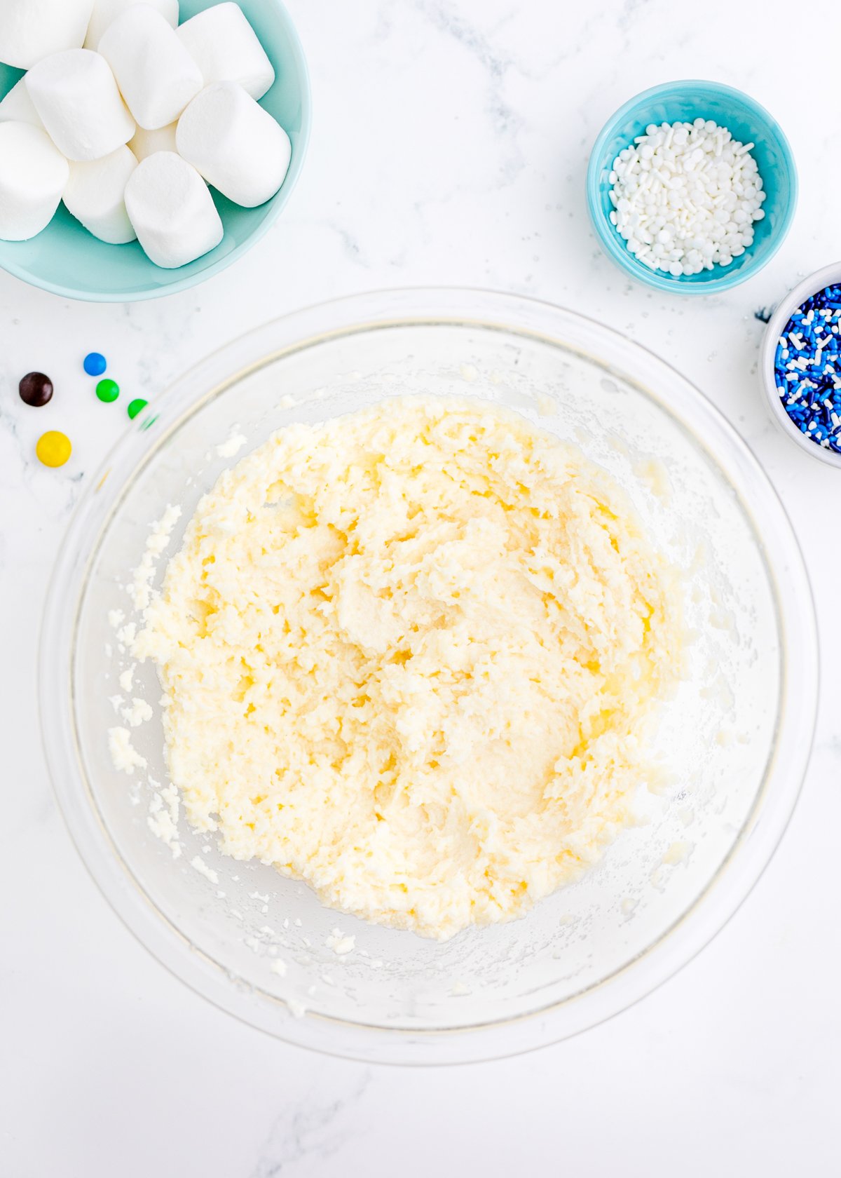 creamed butter and sugar in a glass bowl