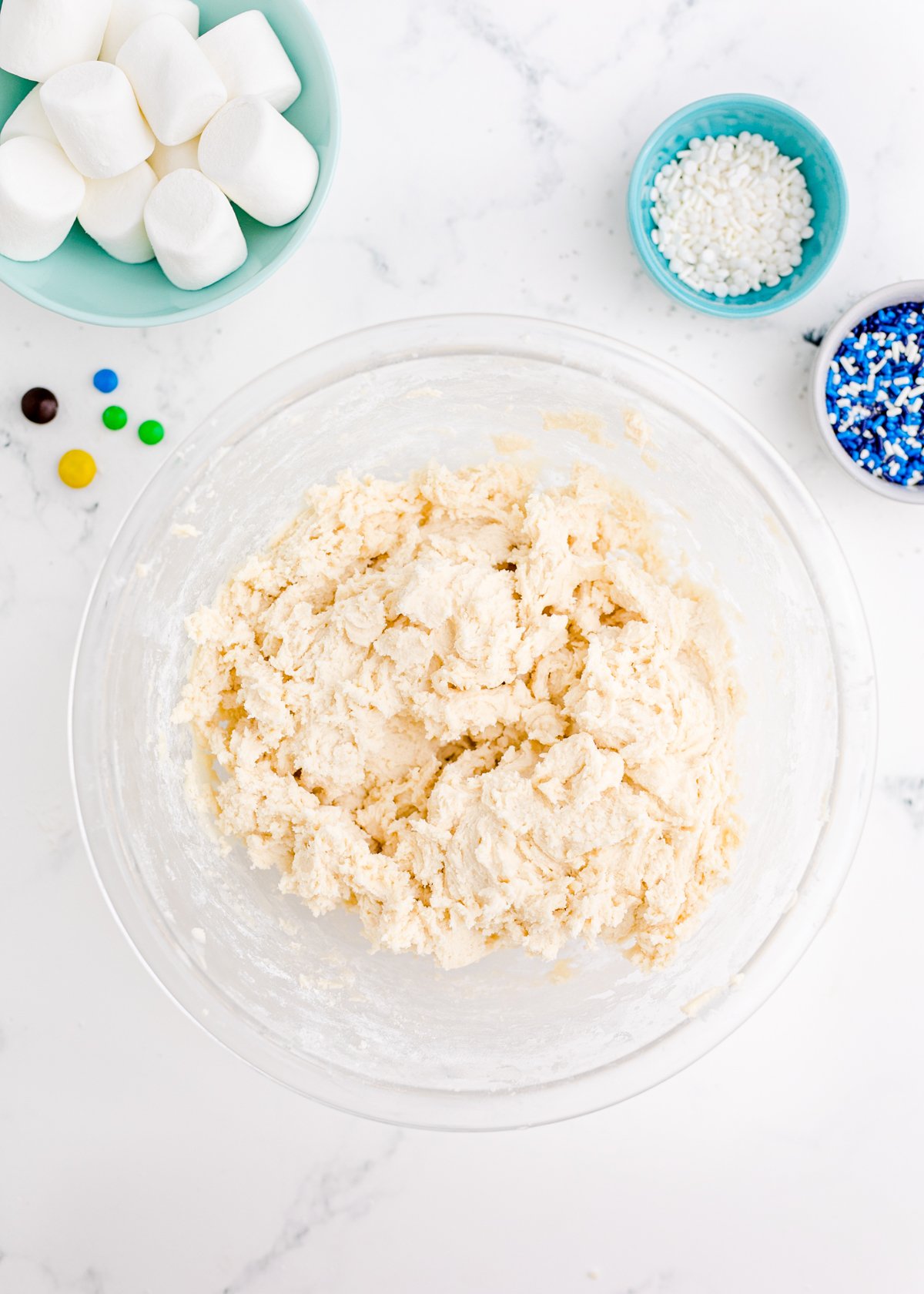 sugar cookie dough in a glass bowl