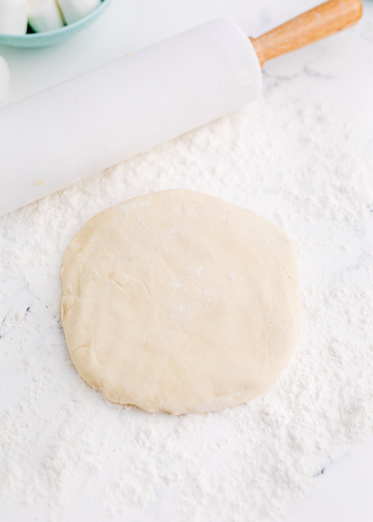 sugar cookie dough and a rolling pin