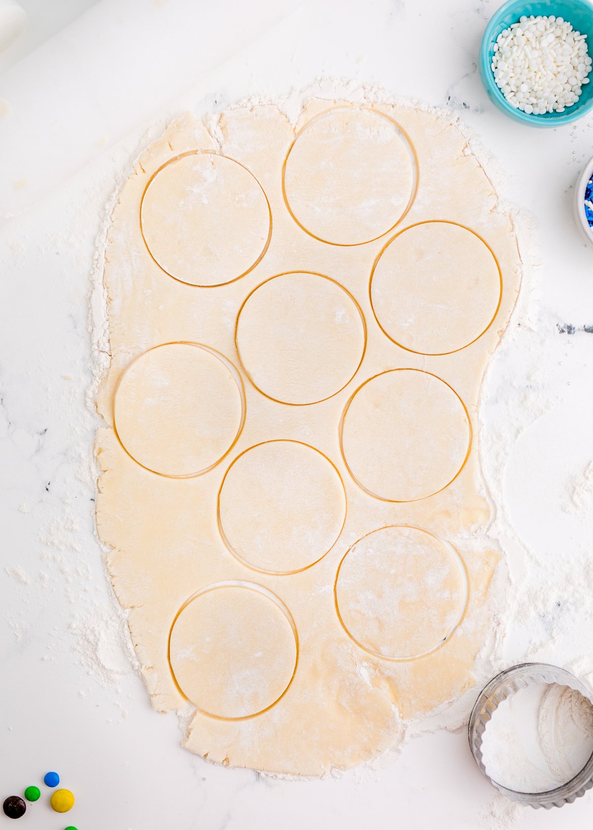 circles cut out of sugar cookie dough