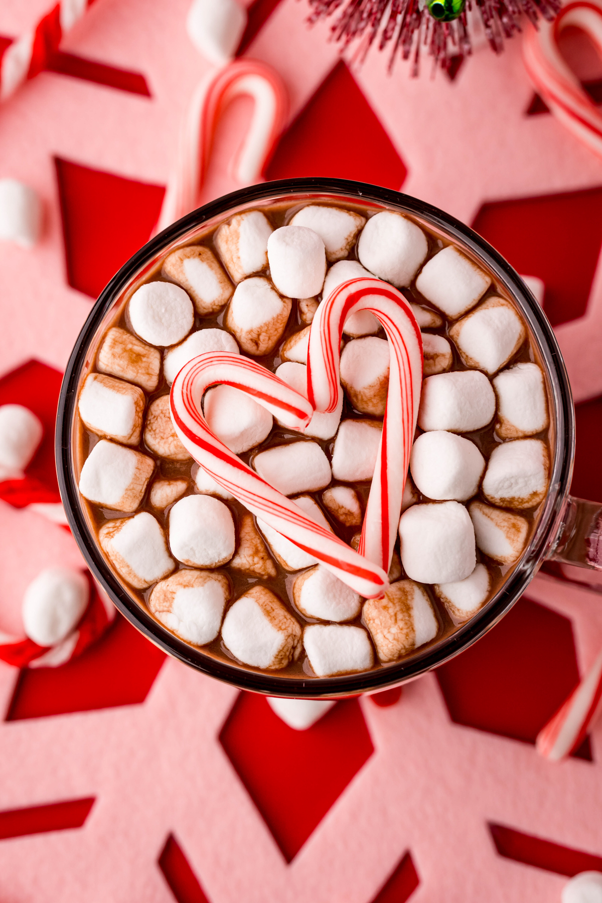 glass mug with peppermint hot chocolate topped with marshmallows