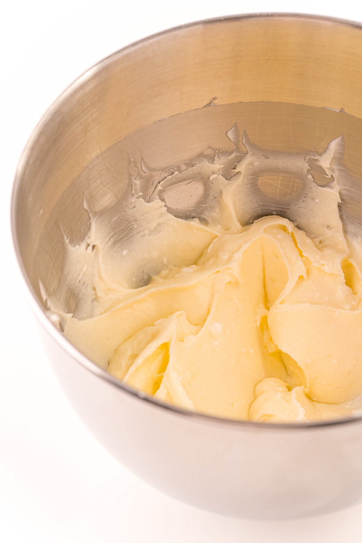 metal bowl with creamed butter and sugar