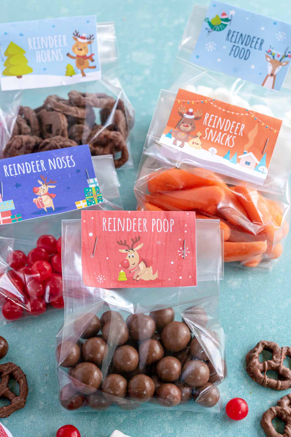 Four bags filled with reindeer treats