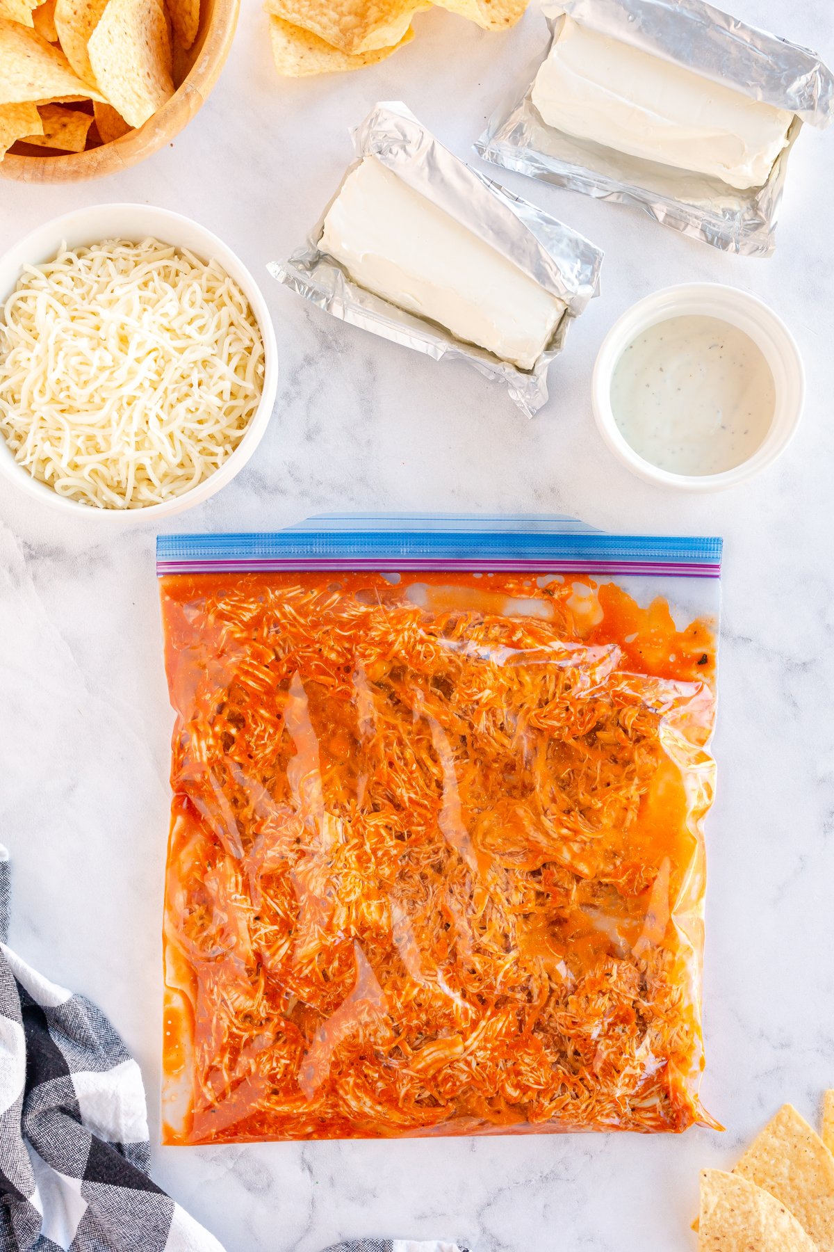 shredded buffalo chicken in a bag