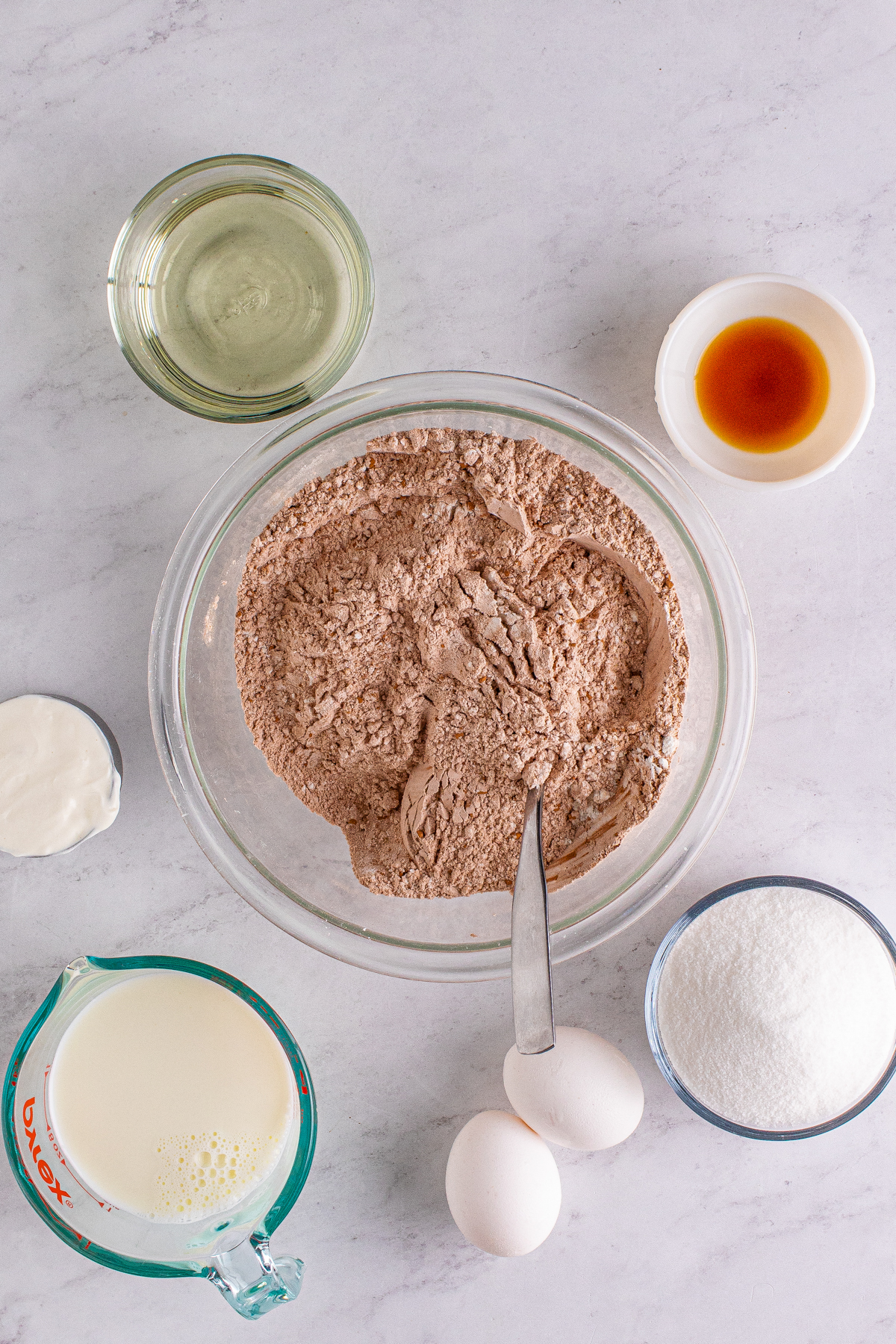 dry ingredients for Nutella muffins in a glass bowl