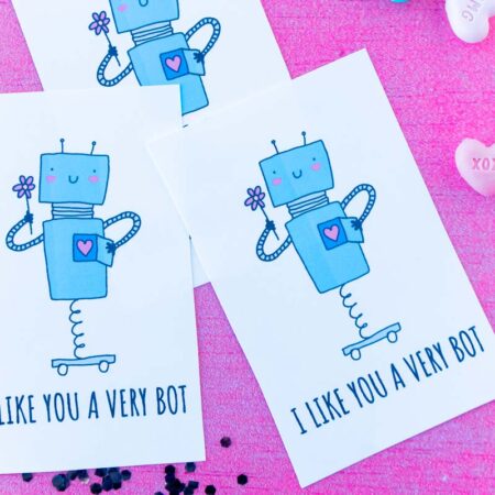 robot valentines on a pink background