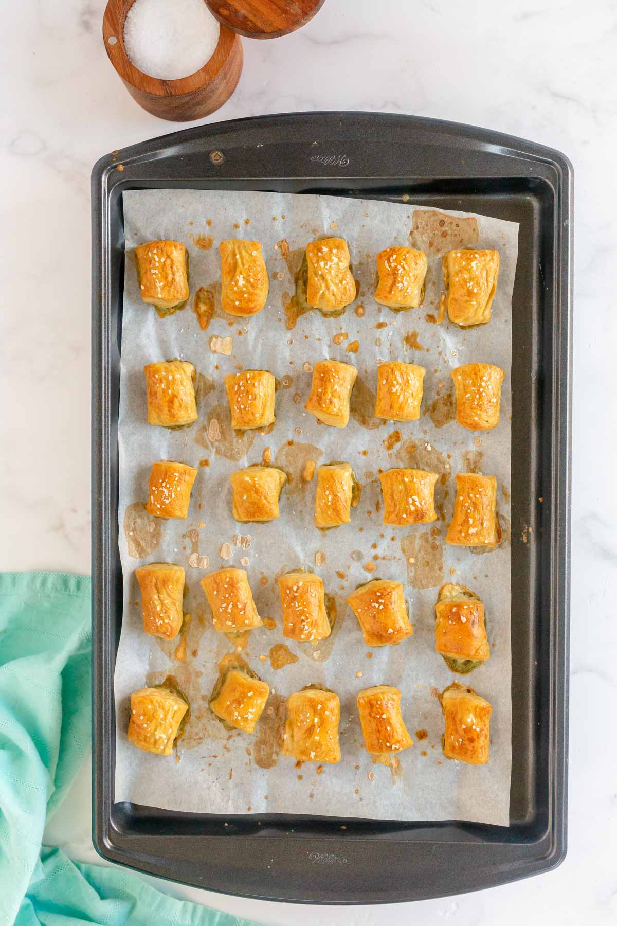 baked soft pretzel bites on a baking sheet